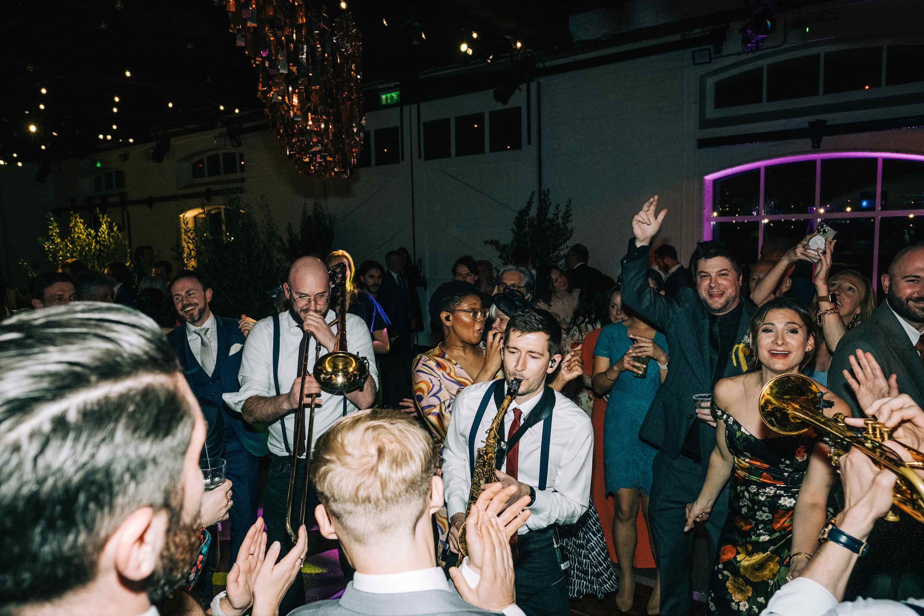 Jo & Justin's weddings - horns storming the dancefloor