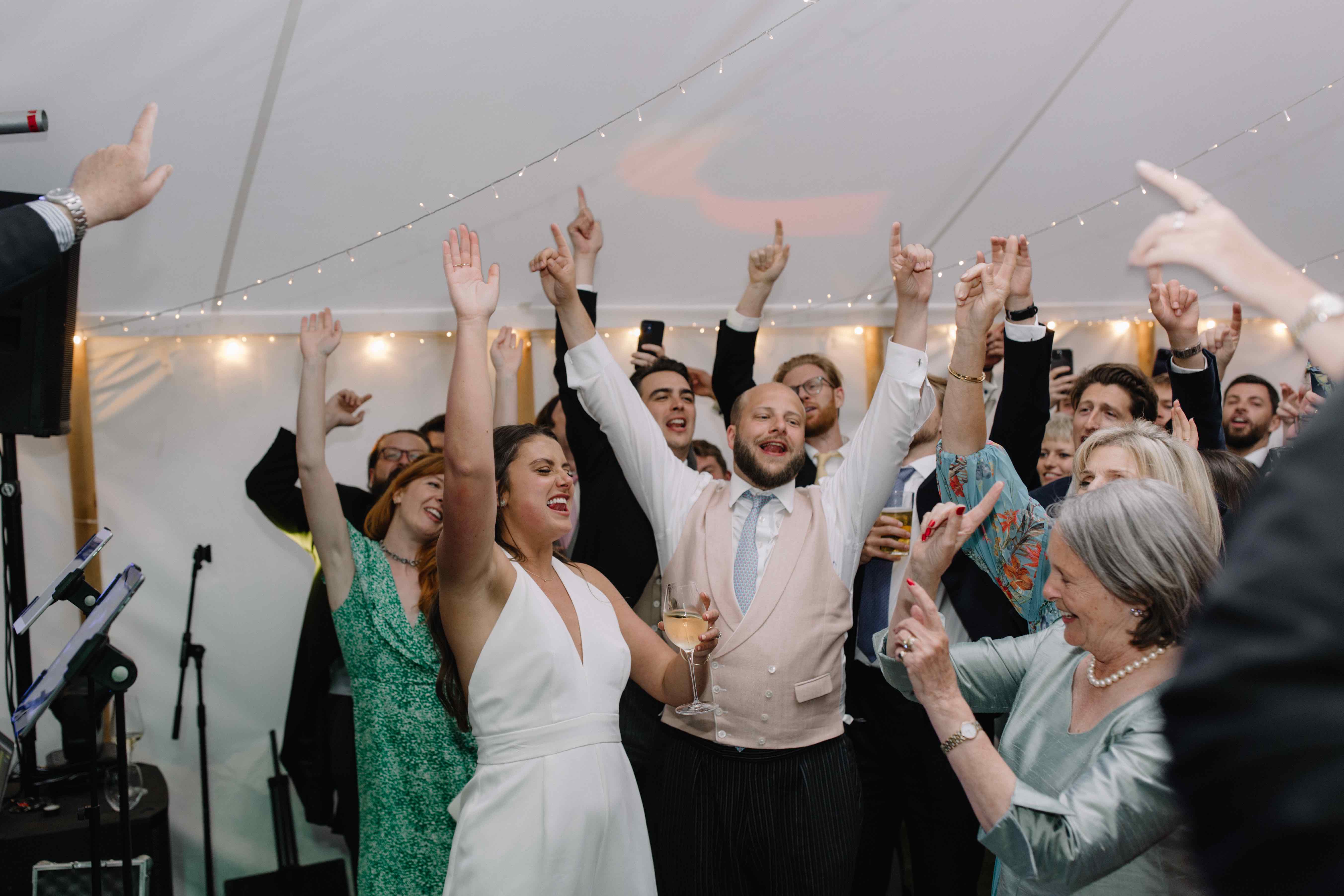 Rose & Alex's wedding - dancing into the marquee